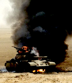 A hit battle tank in flames.