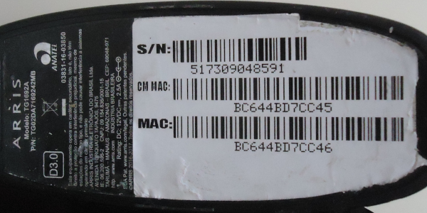Underside label of Arris TG1692A modem SN517309048591