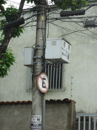 The decrepit concentrator box on a post about 300 metres from my building.